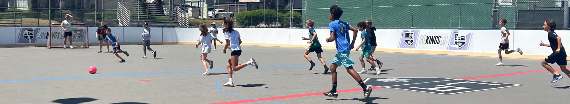 Kids playing on hockey rink
